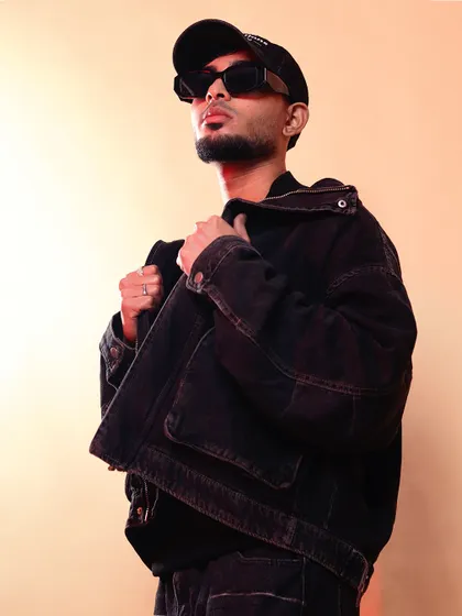 A stylish portrait showcasing my profile and outfit. As an artist, my visual presentation is as curated as my music.