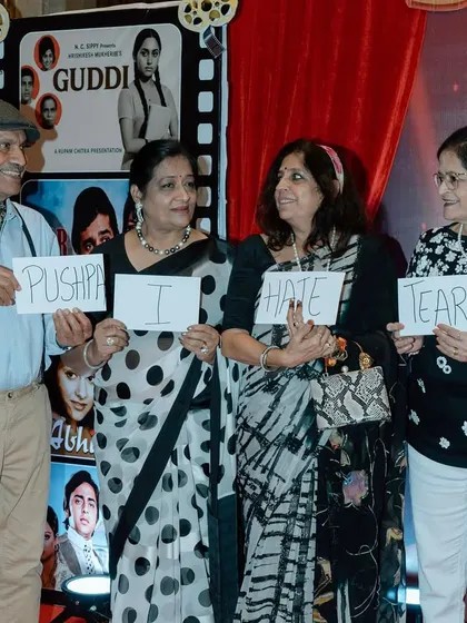 Guests playfully recreating the famous 'Pushpa, I hate tears' line from a classic Bollywood film.