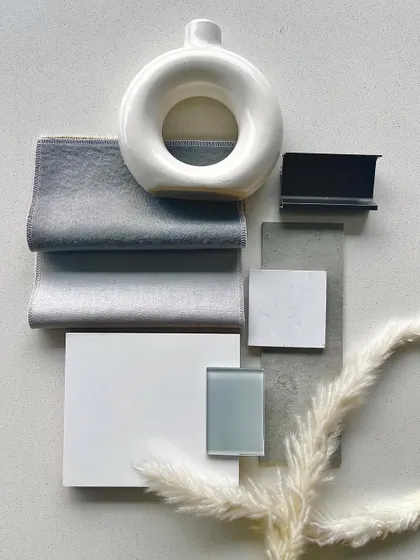 The mood board for our 'Earthy Minimalist' series, featuring a calm palette of greys, whites, and natural textures.