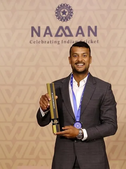 A close-up of Mayank with his BCCI award, a symbol of his hard work and performance in Indian cricket.