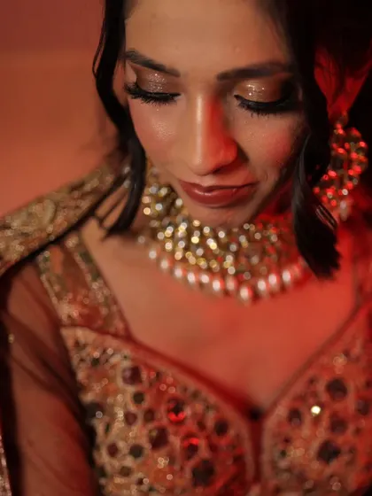 A close-up on the glittery eye makeup for this engagement look. It adds a touch of sparkle without being overpowering.
