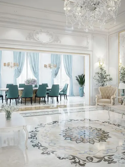 Embodying classical elegance, this villa's living and dining space features intricate marble floor inlays, ornate wall mouldings, and crystal chandeliers. The soft blue and cream color scheme creates a bright, airy, and opulent atmosphere for formal entertaining.