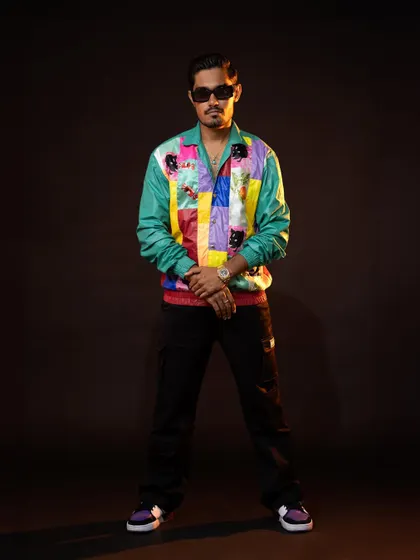 It was super fun styling YouTuber Amit Sharma, "The Indian Unboxer." We created a range of cool, casual looks, including this one with a vibrant patchwork jacket, reflecting his energetic personality.