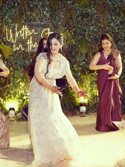 The bride enjoying a dance with her bridesmaids. My goal is to make the process so fun that the performance itself feels like a celebration with your best friends.