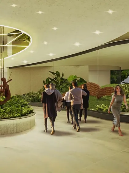 At the Cochin Airport, we designed interior islands with lush greenery and sculptural elements inspired by local culture. The curved ceiling cutout with a mirrored surface reflects the garden below, amplifying the sense of space and light.