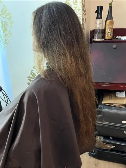 The before shot of Trisha's very long hair.