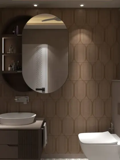 This elegant bathroom features Moroccan-style tiles, a floating vanity, and a custom glass partition for a luxe yet practical finish.