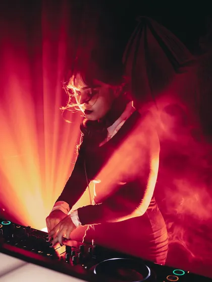 Lost in the music and the red haze during my Halloween DJ set. The lighting and atmosphere are key elements I produce to create a specific mood, whether it's spooky, energetic, or ethereal.