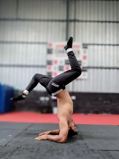 The forearm stand is a great exercise for building shoulder stability and body awareness. Spending time upside down is a key part of our training to develop the control needed for complex acrobatic and stunt work.