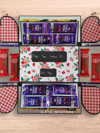 A surprise phone gift for a husband, hidden inside a beautiful chocolate explosion box. This was a custom order to combine his love for tech and chocolate.