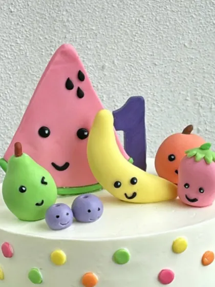 Another view of the handmade fondant fruit toppers.