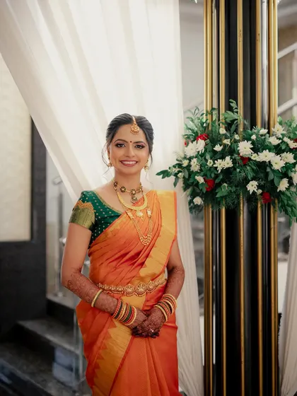 A radiant bride ready for her muhurtham. I created a classic South Indian bridal look with defined eyes and glowing skin to match her beautiful orange Kanjeevaram saree.
