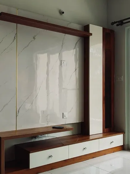 A duplicate of image 271, emphasizing the luxurious combination of marble and wood in this TV unit design.