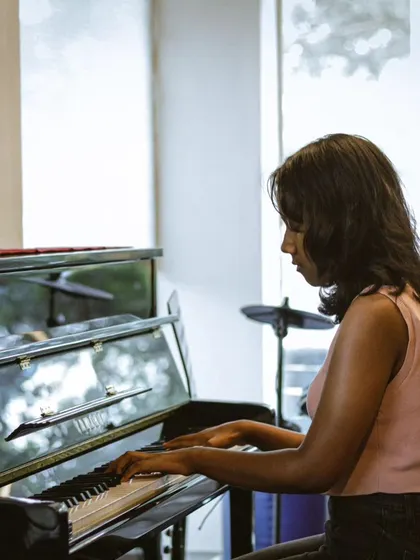 A proud moment from our student recital, with a pianist showcasing her skills. We celebrate the progress and hard work of every single student.