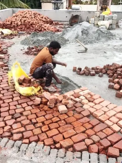 We often use traditional techniques like Brickbat Coba for waterproofing. This time-tested method provides excellent waterproofing and thermal insulation for flat roofs. It's a labor-intensive process, but we believe it offers the best long-term solution.