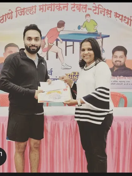Our veteran player Suraj Chandrashekhar receives his prize after winning his first gold medal in the 39+ event at the Thane District Ranking tournament.