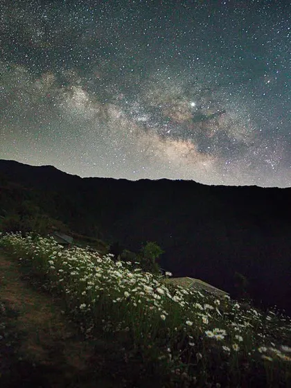 The night sky over The Goat Village near Nag Tibba peak. This beautiful spot, surrounded by chamomile flowers in the right season, is an excellent location for astrophotography.