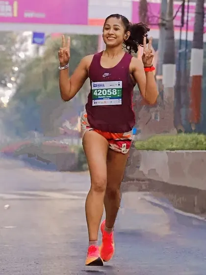 Peace and power. Flashing a peace sign during a race, feeling in control and confident in my training.