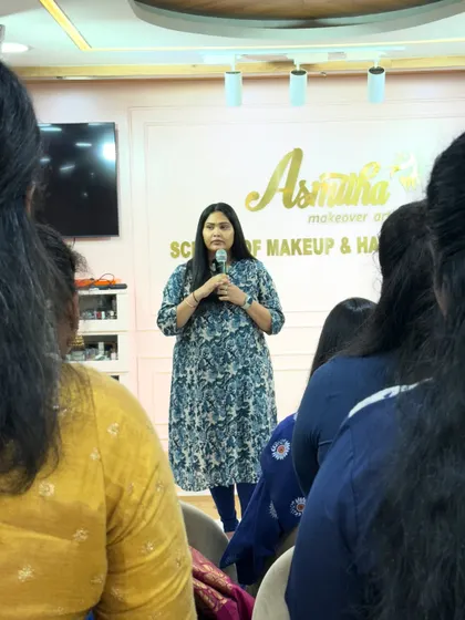 Addressing my students on their graduation day. I share my final words of encouragement and advice as they prepare to enter the professional world of makeup artistry.