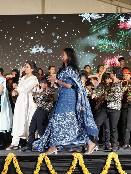 Leading my group of young performers on stage. My choreography for kids focuses on simple, fun movements that make them feel confident and happy. It’s all about creating a positive experience for everyone involved.