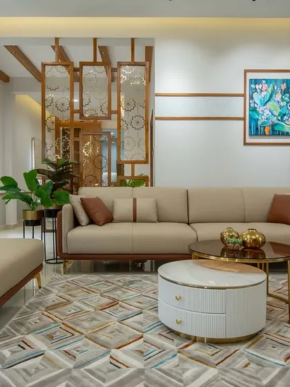 This living room showcases a blend of textures and forms, with a comfortable beige sofa, a unique round coffee table with storage, and a decorative wooden partition. The space feels open and elegant, perfect for a modern family home.