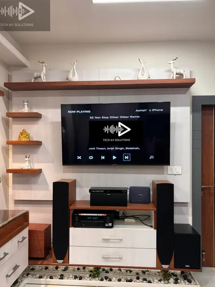 The same 7.2.2 living room system, now playing music. A good home theater setup is not just for movies; it's also fantastic for listening to music, with clarity and depth that small speakers can't match.