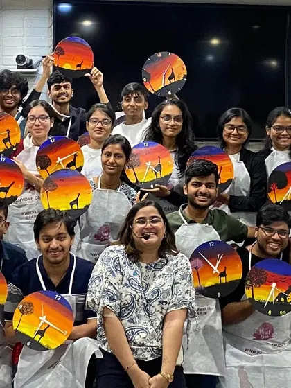 The LinkedIn team with their amazing hand-painted clocks. This workshop is a fun twist on our classic painting session, and the results are always so impressive.