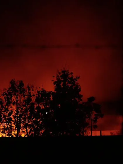 The red glow of burning fields against the night sky. This practice is often overlooked compared to winter stubble burning but is just as destructive.