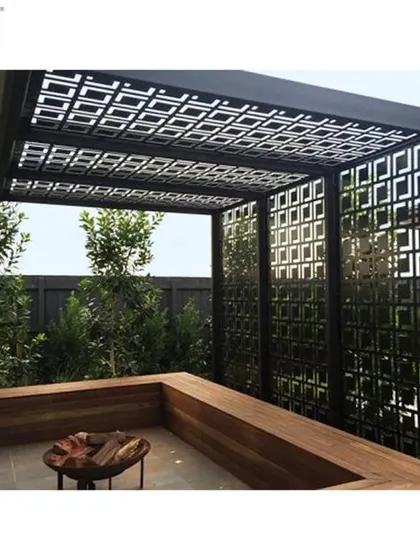 This project showcases a contemporary pergola design with laser-cut geometric screens that offer both privacy and style. The built-in wooden bench and space for a fire pit make it a modern and functional hub for outdoor entertaining.