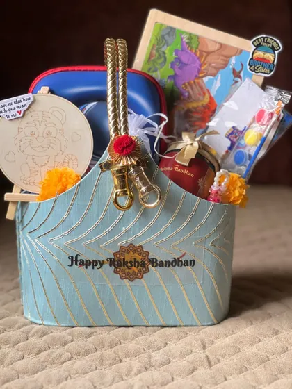 The complete blue Rakhi basket, a perfect blend of traditional elegance and fun activities for the whole family to enjoy.