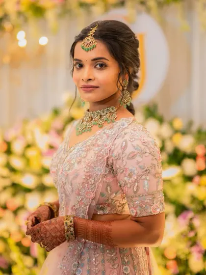 A portrait of the bride. Her makeup is soft and pretty, letting her natural beauty shine through.