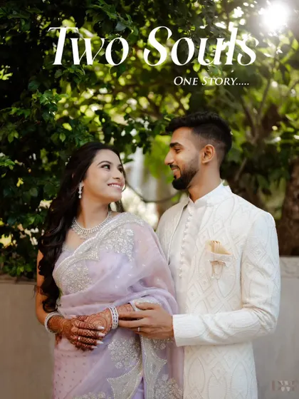 Two souls, one story. This portrait captures the elegance of the couple in their beautiful ethnic wear, with soft sunlight filtering through the leaves, creating a dreamy, romantic mood.
