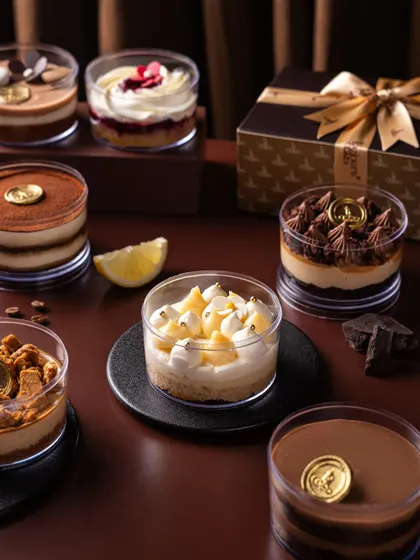 A glimpse into my late-night dessert menu, handcrafted in small batches. From the zesty Lemon Cake to the classic Tiramisu, each dessert tub is a personal treat, also available in a curated gift box.