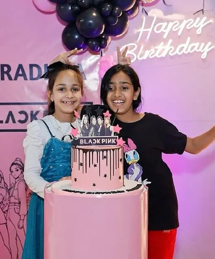 A Blackpink-themed birthday party for a super fan. We used a pink and black color palette with a custom cake to bring the K-pop theme to life.