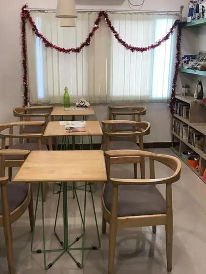A view of our cozy café area, where pet parents can relax with a book or get some work done in a quiet, comfortable setting.