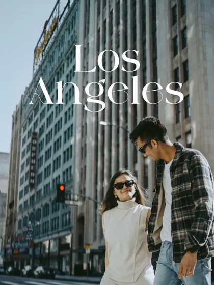 This image serves as a title card for a Los Angeles love story, with the city's towering architecture framing a stylish couple. It sets a cool, urban tone for their pre-wedding photography session.