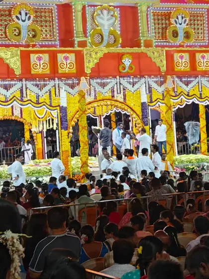 The audience at the Madarati temple, where the story of the five serpent-sisters is central to the local lore.