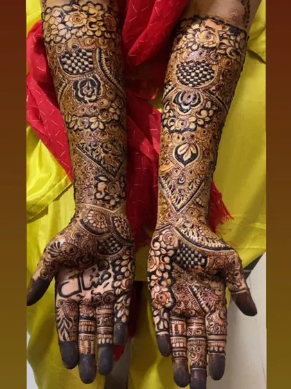 This is a detailed view of my intricate bridal henna work. Each design is unique, combining traditional patterns like paisleys and mandalas with fine-line fillers to create a stunning, full-coverage look for your special day.