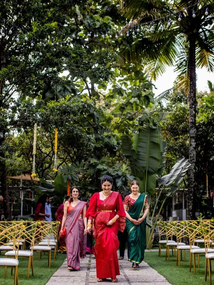 The bride's procession down a beautiful garden aisle. We ensure every path to the altar is as beautiful as the destination.