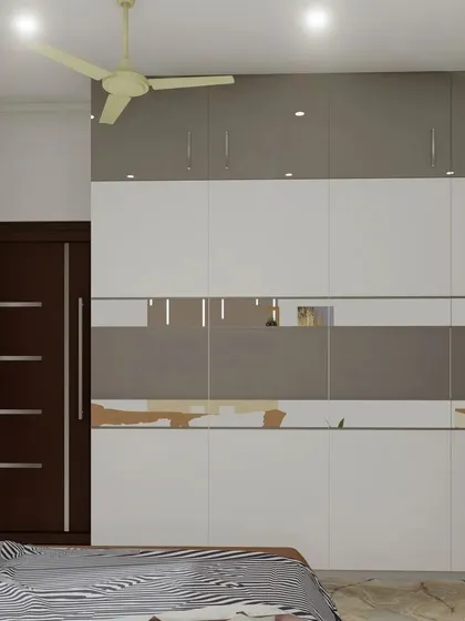 This view shows the full length of the wardrobe and its mirrored accent, which adds functionality and a sense of space to the room.