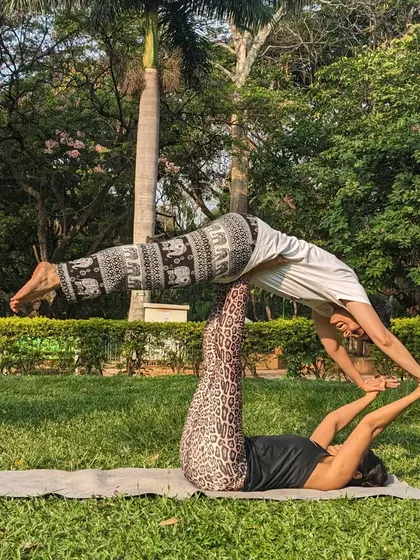 My singles-only events often include wellness activities like Acro Yoga in the park. It's a fun, interactive way to build trust and connection beyond just talking.