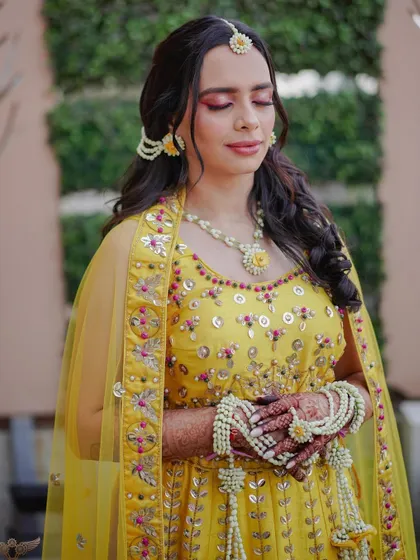 A close up of Dr. Archita's experimental haldi makeup. The pink eyeshadow is bold and beautiful.