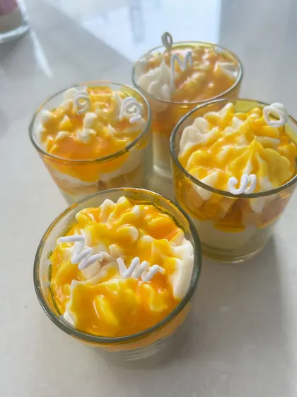 A set of four mango dessert candles, perfect for summer. These can be customized with initials.