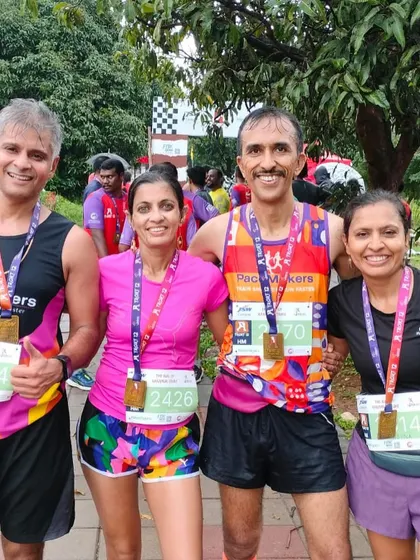 Post race photo with my running group. We train together, race together, and celebrate our achievements as a team.
