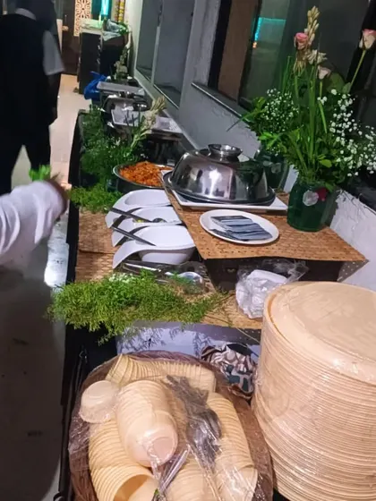 A simple yet elegant buffet setup for a house warming ceremony. We use natural elements like fresh greens to decorate the table.