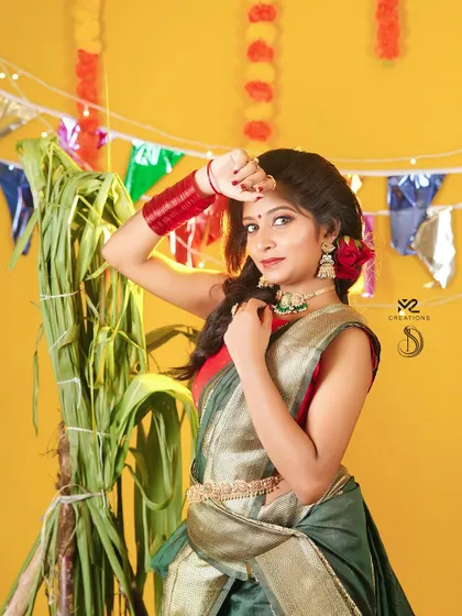 A playful pose from the Pongal shoot. The simple hip chain and choker are perfect accessories for a half-saree or langa voni.