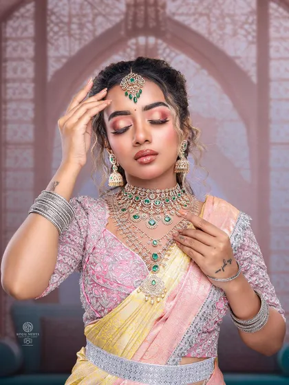 Another pose from the masterclass shoot, highlighting the texture and volume of the open hairstyle. This demonstrates how to create camera-ready hair.