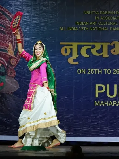 A series of photos from a Gidha performance at a national competition in Pune, showcasing the colorful costumes and lively spirit of this Punjabi folk dance.
