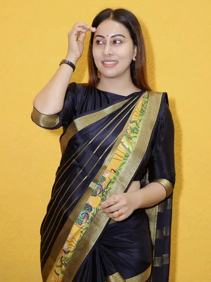 A close-up of Dr. Shruthi Gowda looking radiant in her custom Dhavala saree.