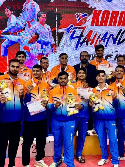 A closer look at our men's team with their medals at the Thailand Open Karate Championship. Their performance contributed significantly to India's overall second-place finish.
